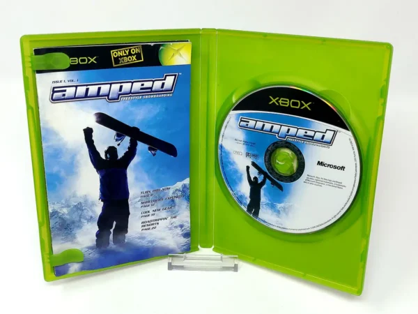 Interior del juego Amped: Freestyle Snowboarding (UK) para XBOX con disco y manual