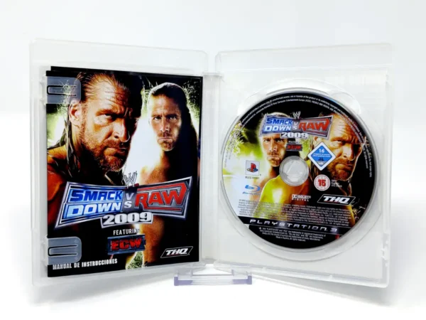Interior del juego WWE SmackDown vs. Raw 2009 (ESP) para PlayStation 3 con disco y manual