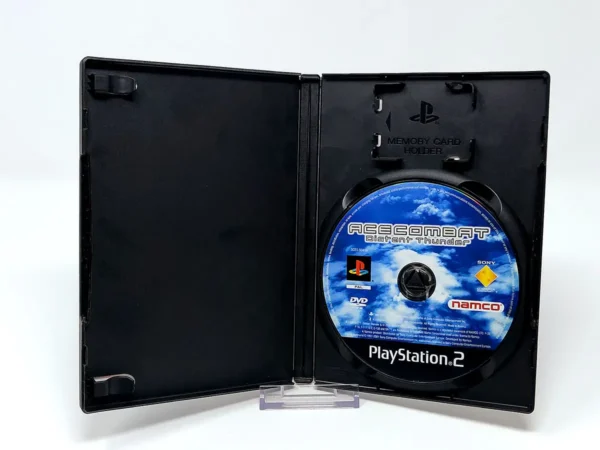 Interior del juego Ace Combat: Trueno de Acero (ESP) (Rebajado) para PlayStation 2 con disco y manual
