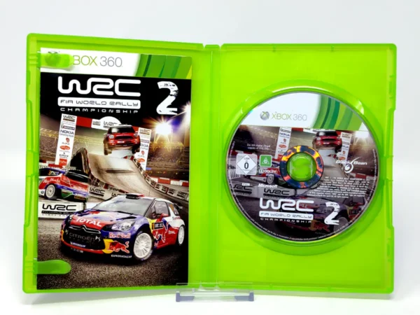 Interior del juego WRC 2: FIA World Rally Championship (ESP) para XBOX 360 con disco y manual