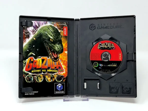 Interior del juego Godzilla: Destroy All Monsters Melee (EUR) para Nintendo GameCube con disco y manual