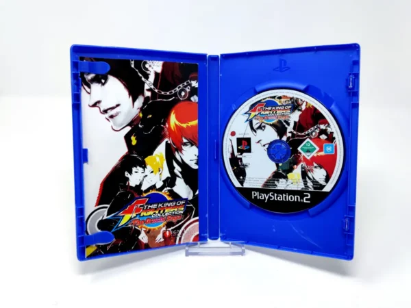 Interior del juego The King of Fighters Collection: The Orochi Saga (UK) para PlayStation 2 con disco y manual
