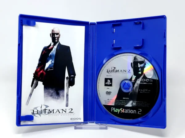 Interior del juego Hitman 2: Silent Assassin (ESP) para PlayStation 2 con disco y manual
