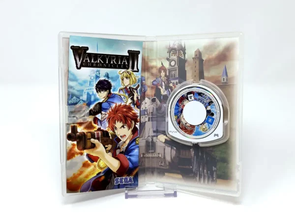 Interior del juego Valkyria Chronicles II (ESP) para PSP con disco y manual