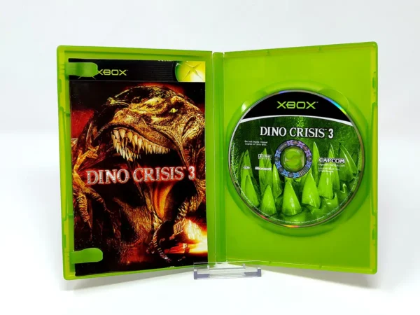 Interior del juego Dino Crisis 3 (ESP) para XBOX con disco y manual