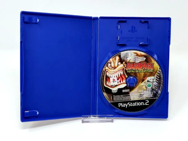 Interior del juego Rampage: Total Destruction (FRA) (Rebajado) para PlayStation 2 con disco y manual