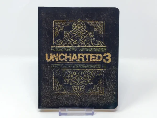 Interior del juego Uncharted 3: La Traición de Drake (Edición Especial) (ESP) para PlayStation 3 con disco y manual