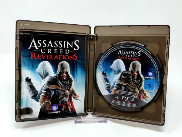 Interior del juego Assassin's Creed: Revelations (ESP) para PlayStation 3 con disco y manual