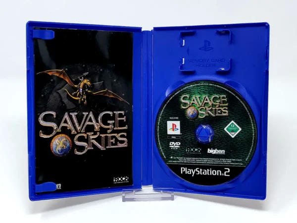 Interior del juego Savage Skies (ESP) para PlayStation 2 con disco y manual