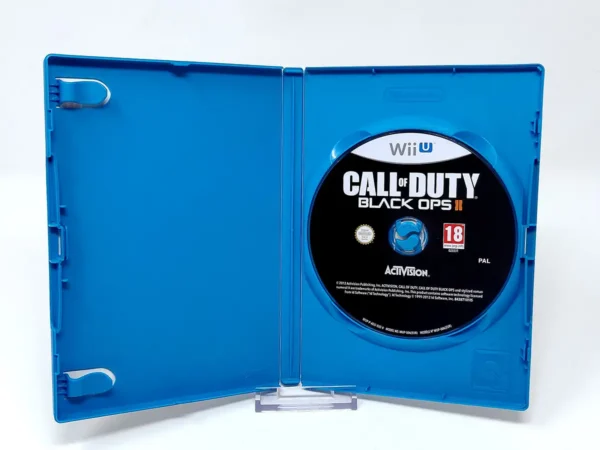 Interior del juego Call of Duty: Black Ops II (ESP) (Rebajado) para Nintendo Wii U con disco y manual