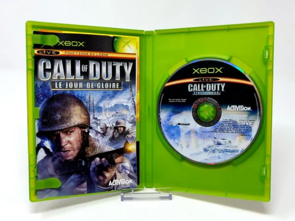 Interior del juego Call of Duty: Le Jour de Gloire (FRA) para XBOX con disco y manual