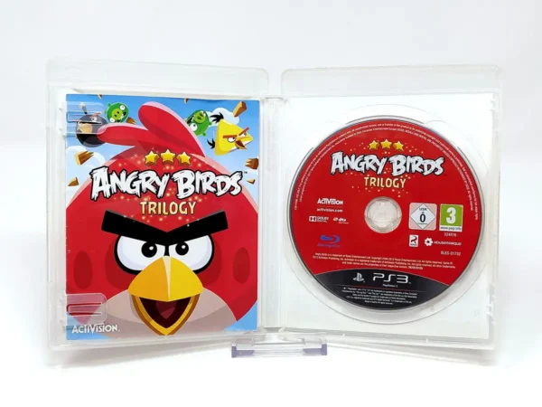 Interior del juego Angry Birds Trilogy (ESP) para PlayStation 3 con disco y manual