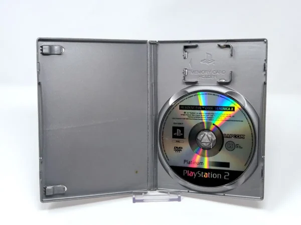 Interior del juego Resident Evil: Code - Veronica X (ESP) (Platinum) (v2) (Rebajado) para PlayStation 2 con disco y manual