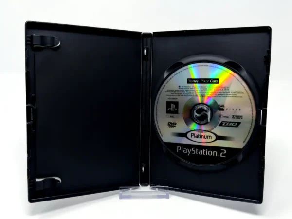 Interior del juego Disney/Pixar Cars (ESP) (Platinum) (Rebajado) para PlayStation 2 con disco y manual