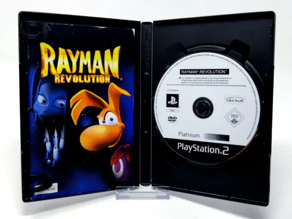 Interior del juego Rayman Revolution (ESP) (Platinum) (Rebajado) para PlayStation 2 con disco y manual