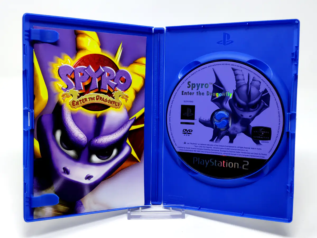 Interior del juego Spyro: Enter the Dragonfly (ESP) para PlayStation 2 con disco y manual
