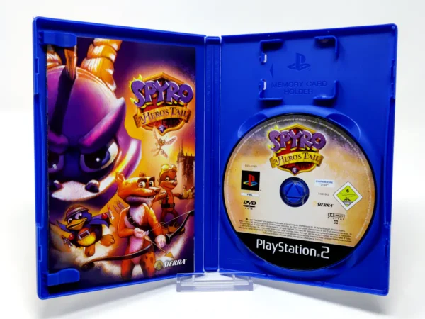 Interior del juego Spyro: A Hero's Tail (ESP) para PlayStation 2 con disco y manual