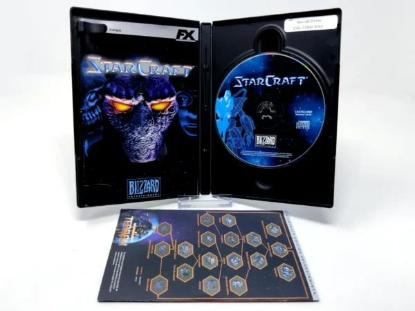 Interior del juego Starcraft (ESP) para PC con disco y manual