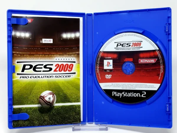 Interior del juego PES 2009: Pro Evolution Soccer (ESP) para PlayStation 2 con disco y manual