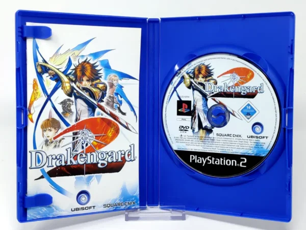 Interior del juego Drakengard 2 (ESP) para PlayStation 2 con disco y manual