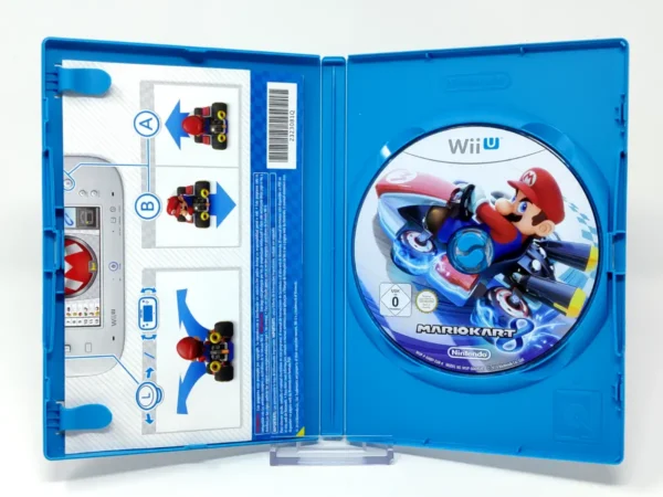 Interior del juego Mario Kart 8 (ESP) para Nintendo Wii U con disco y manual
