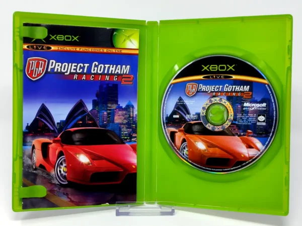 Interior del juego Project Gotham Racing 2 (ESP) para XBOX con disco y manual