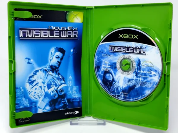 Interior del juego Deus Ex: Invisible War (ESP) para XBOX con disco y manual