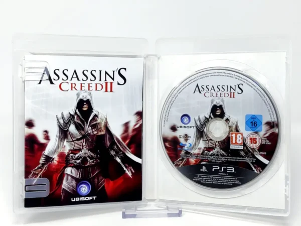 Interior del juego Assassin's Creed II (ESP) (v1) para PlayStation 3 con disco y manual