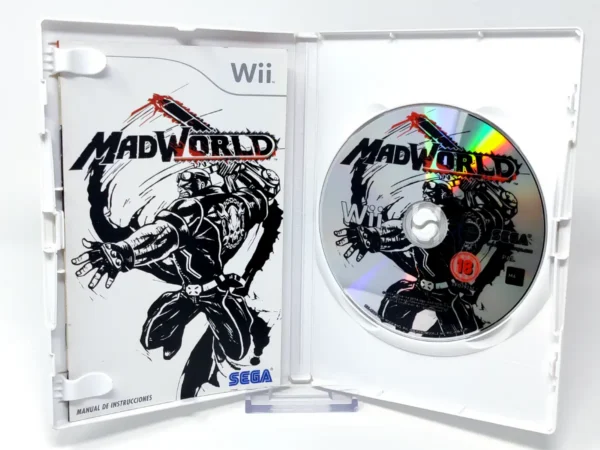 Interior del juego MadWorld (ESP) para Nintendo Wii con disco y manual