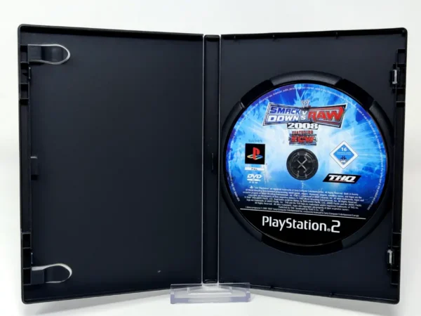 Interior del juego WWE SmackDown vs. Raw 2008 (ESP) (Rebajado) para PlayStation 2 con disco y manual
