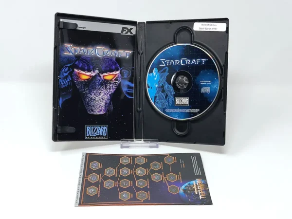 Interior del juego Starcraft (ESP) para PC con disco y manual