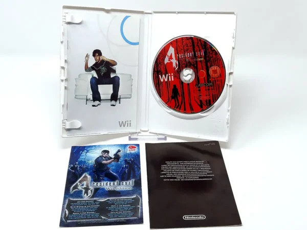 Interior del juego Resident Evil 4: Wii Edition (ESP) (Rebajado) para Nintendo Wii con disco y manual