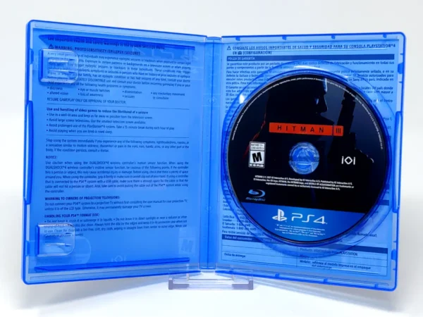 Interior del juego Hitman 3 (USA) para PlayStation 4 con disco y manual