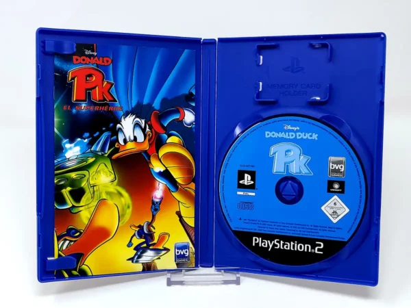 Interior del juego Disney's Donald Duck PK: El Superhéroe (ESP) para PlayStation 2 con disco y manual