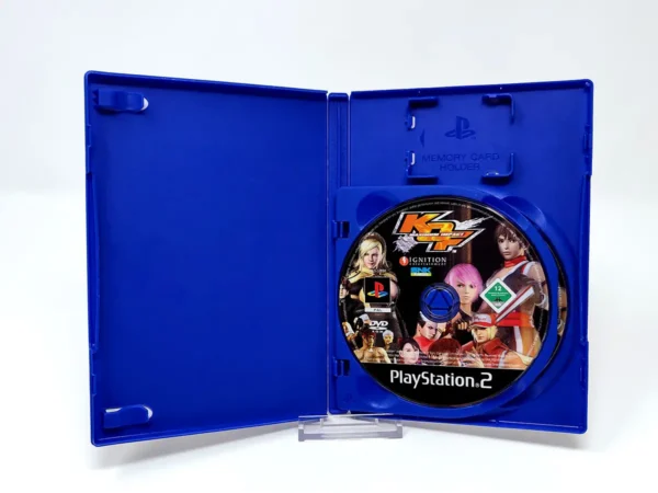 Interior del juego The King of Fighters: Maximum Impact (FRA) (Rebajado) para PlayStation 2 con disco y manual