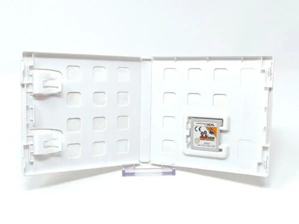 Interior del juego Mario & Luigi: Paper Jam Bros. (ESP) para Nintendo 3DS con disco y manual