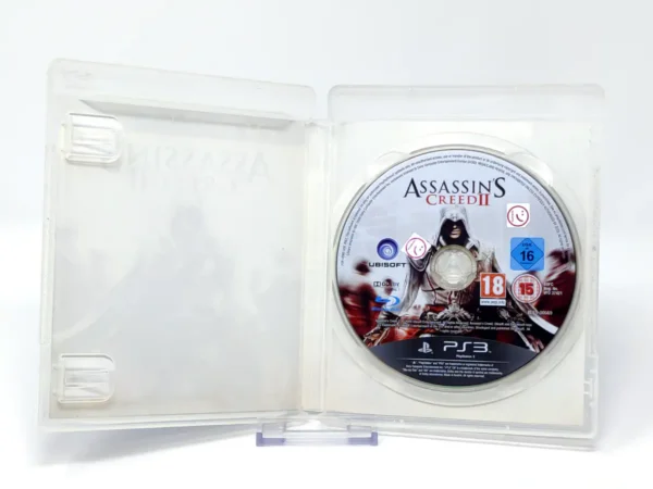 Interior del juego Assassin's Creed II (ESP) (v1) (Rebajado) para PlayStation 3 con disco y manual