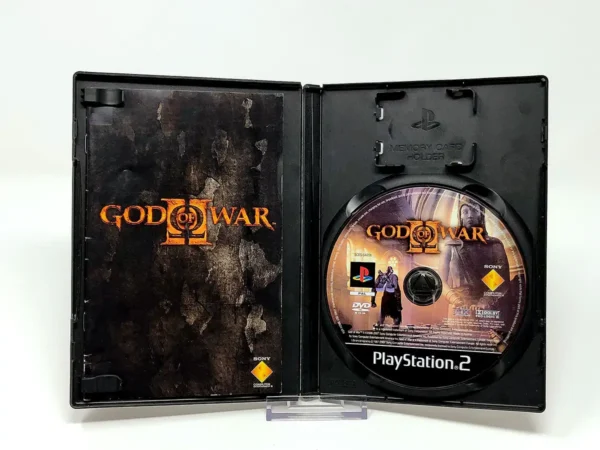 Interior del juego God of War II (ESP) para PlayStation 2 con disco y manual