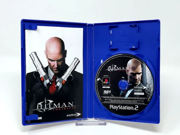 Interior del juego Hitman: Contracts (UK) para PlayStation 2 con disco y manual