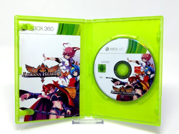 Interior del juego Arcana Heart 3 (UK) para XBOX 360 con disco y manual