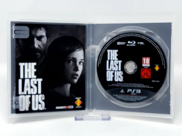 Interior del juego The Last of Us (ESP) para PlayStation 3 con disco y manual
