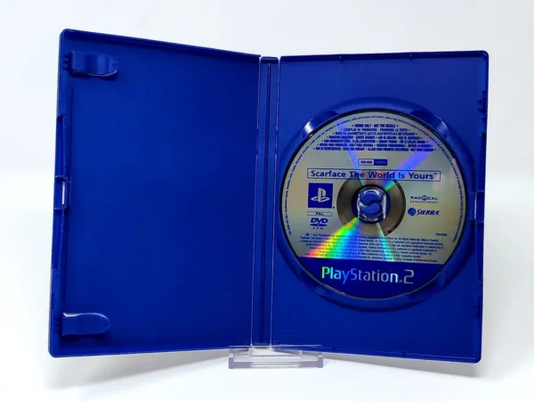 Interior del juego Scarface: The World Is Yours (ESP) (Promo) para PlayStation 2 con disco y manual