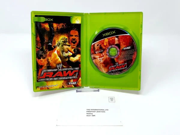 Interior del juego WWE Raw (UK) para XBOX con disco y manual