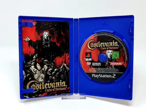 Interior del juego Castlevania: Curse of Darkness (ESP) para PlayStation 2 con disco y manual