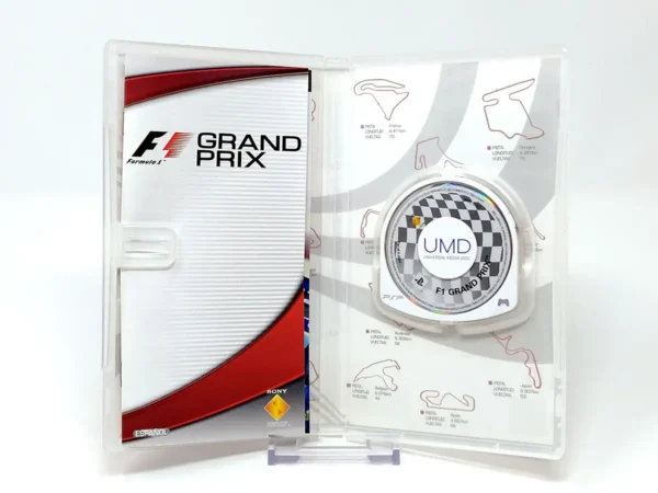 Interior del juego F1 Grand Prix (ESP) para PSP con disco y manual
