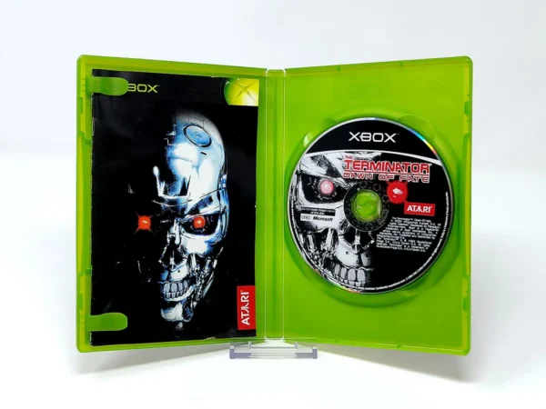 Interior del juego The Terminator: Dawn of Fate (ESP) para XBOX con disco y manual