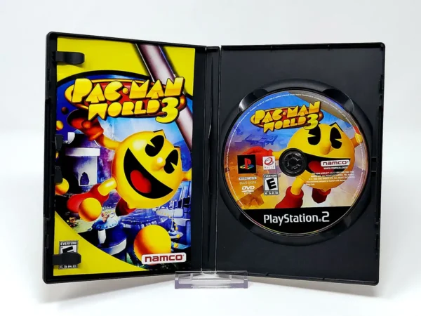Interior del juego Pac-Man World 3 (USA) para PlayStation 2 con disco y manual