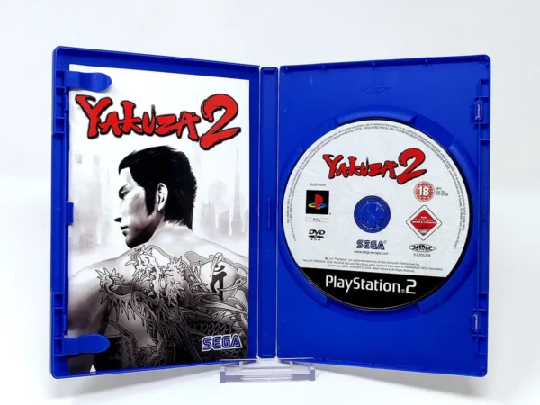 Interior del juego Yakuza 2 (ESP) para PlayStation 2 con disco y manual