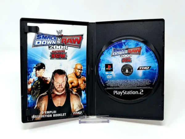 Interior del juego WWE SmackDown vs. Raw 2008 (FRA) para PlayStation 2 con disco y manual