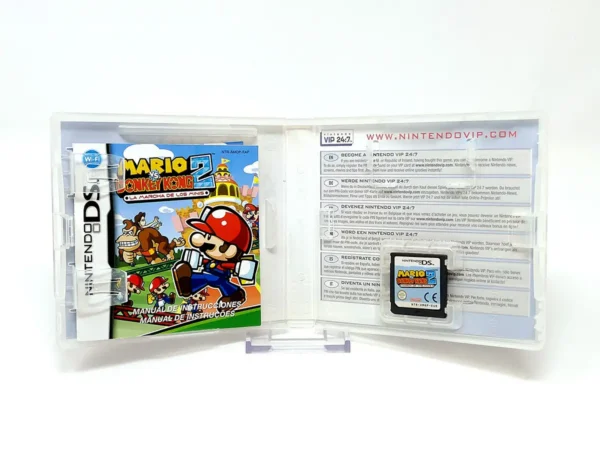 Interior del juego Mario vs. Donkey Kong 2: La Marcha de los Minis (ESP) para Nintendo DS con disco y manual